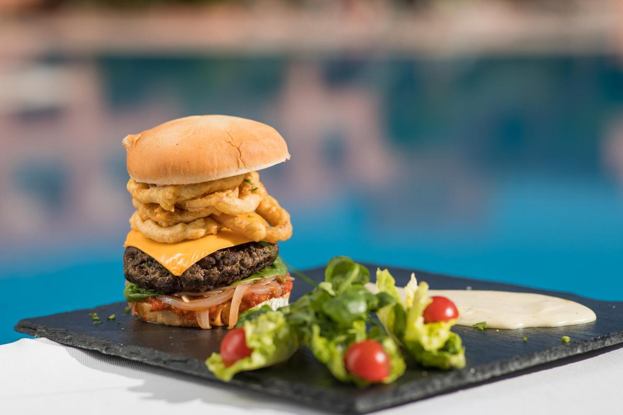 Grand Mogador Agdal & Spa Marrakesh Exterior photo A burger with onion rings